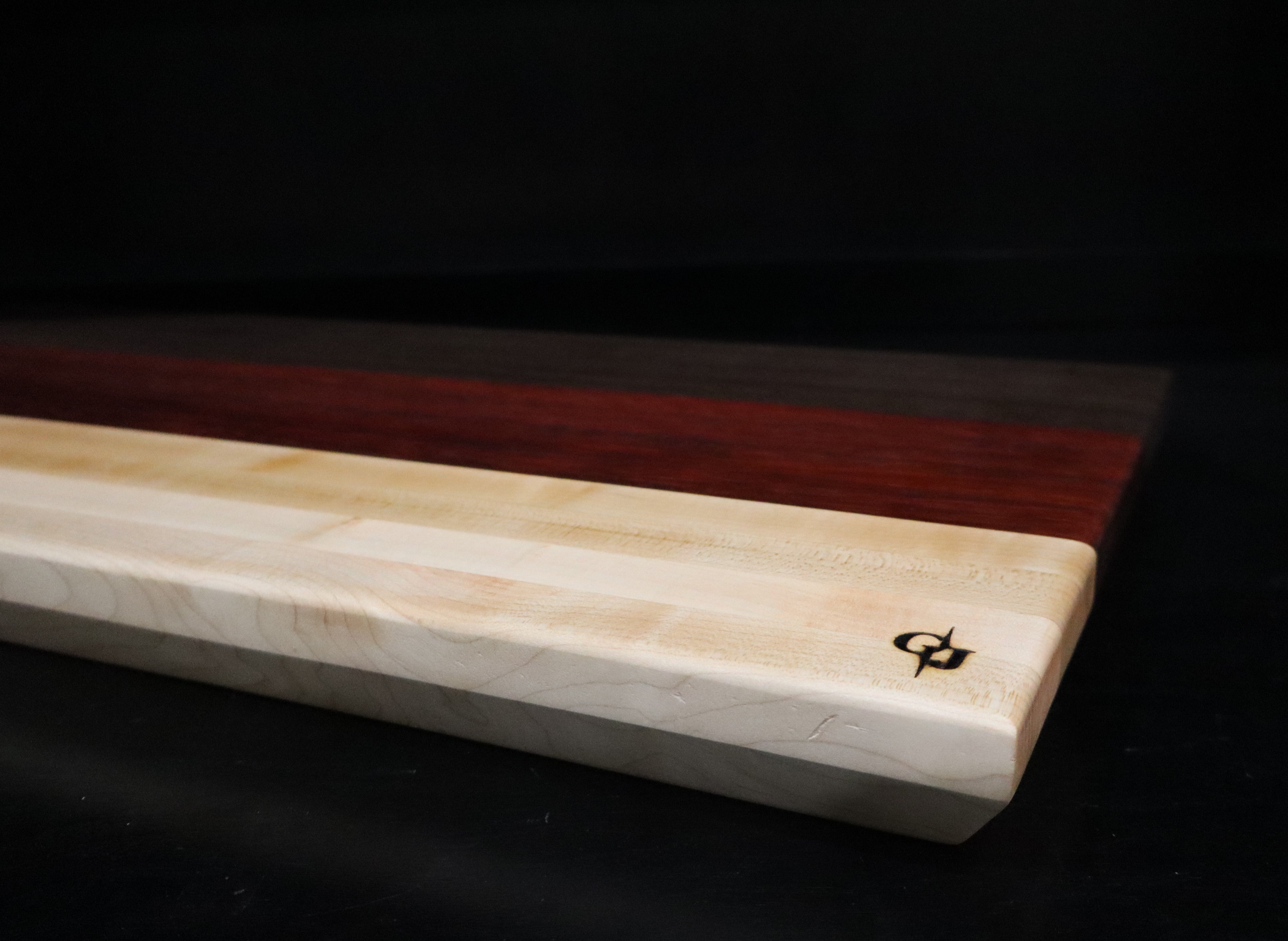 Maple, Wenge and outlets Padauk cutting board.