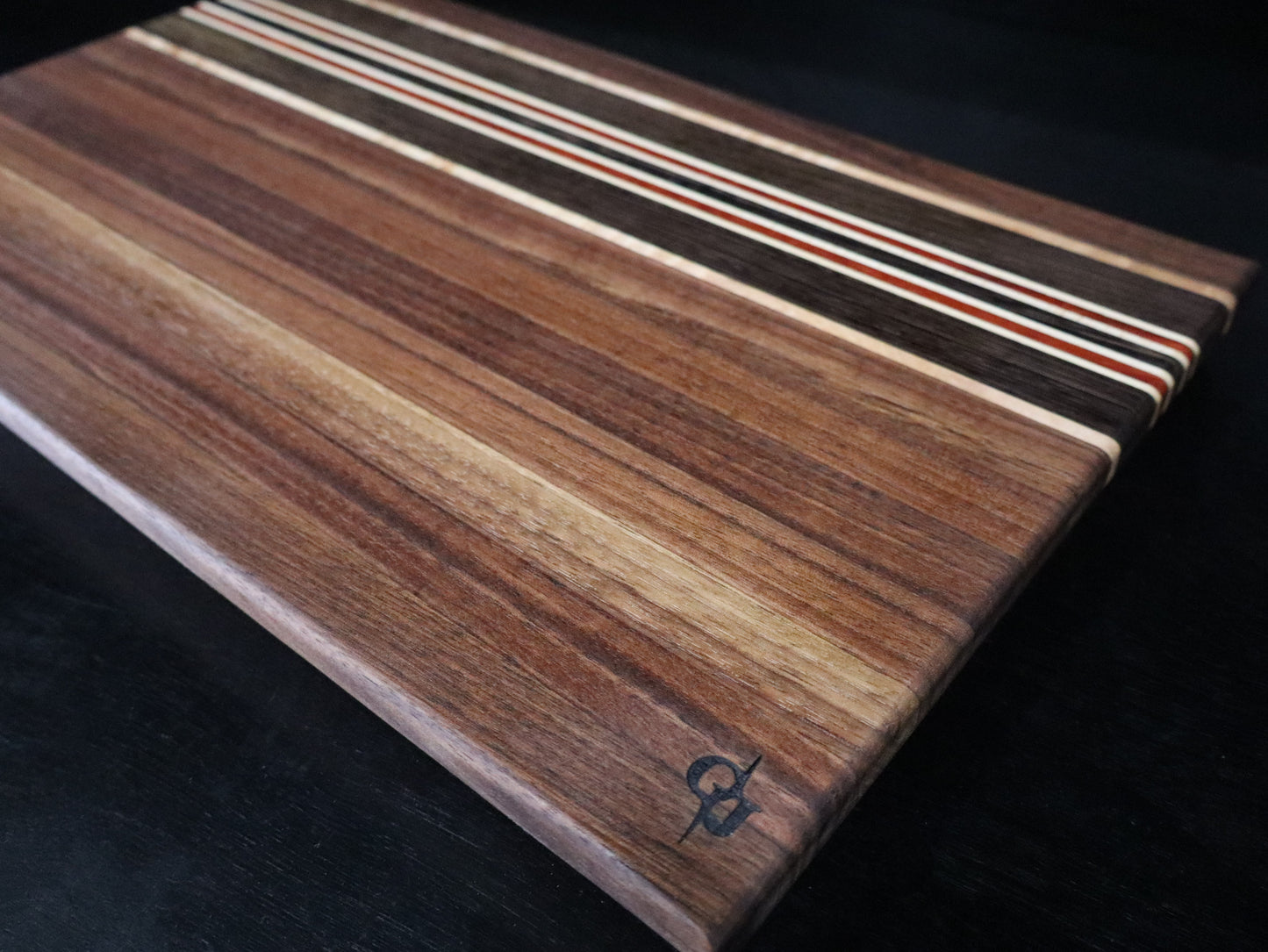 Walnut, Paduk, Maple, and Wenge Edge-Grain Cutting Board