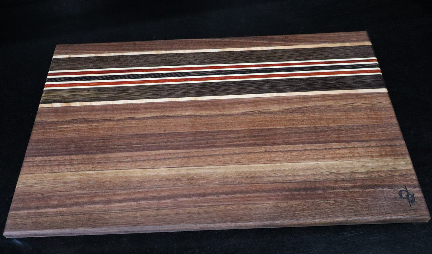 Walnut, Paduk, Maple, and Wenge Edge-Grain Cutting Board