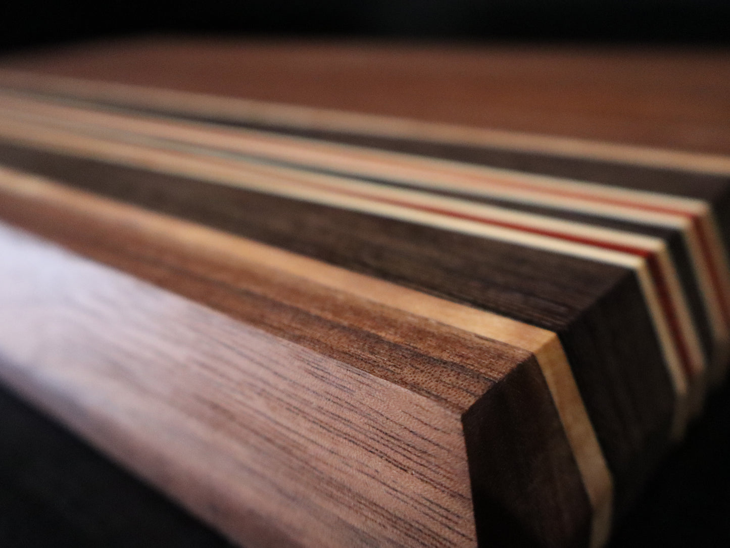 Walnut, Paduk, Maple, and Wenge Edge-Grain Cutting Board